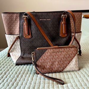 Three sectional multi colored Michael Kors tote and matching wallet